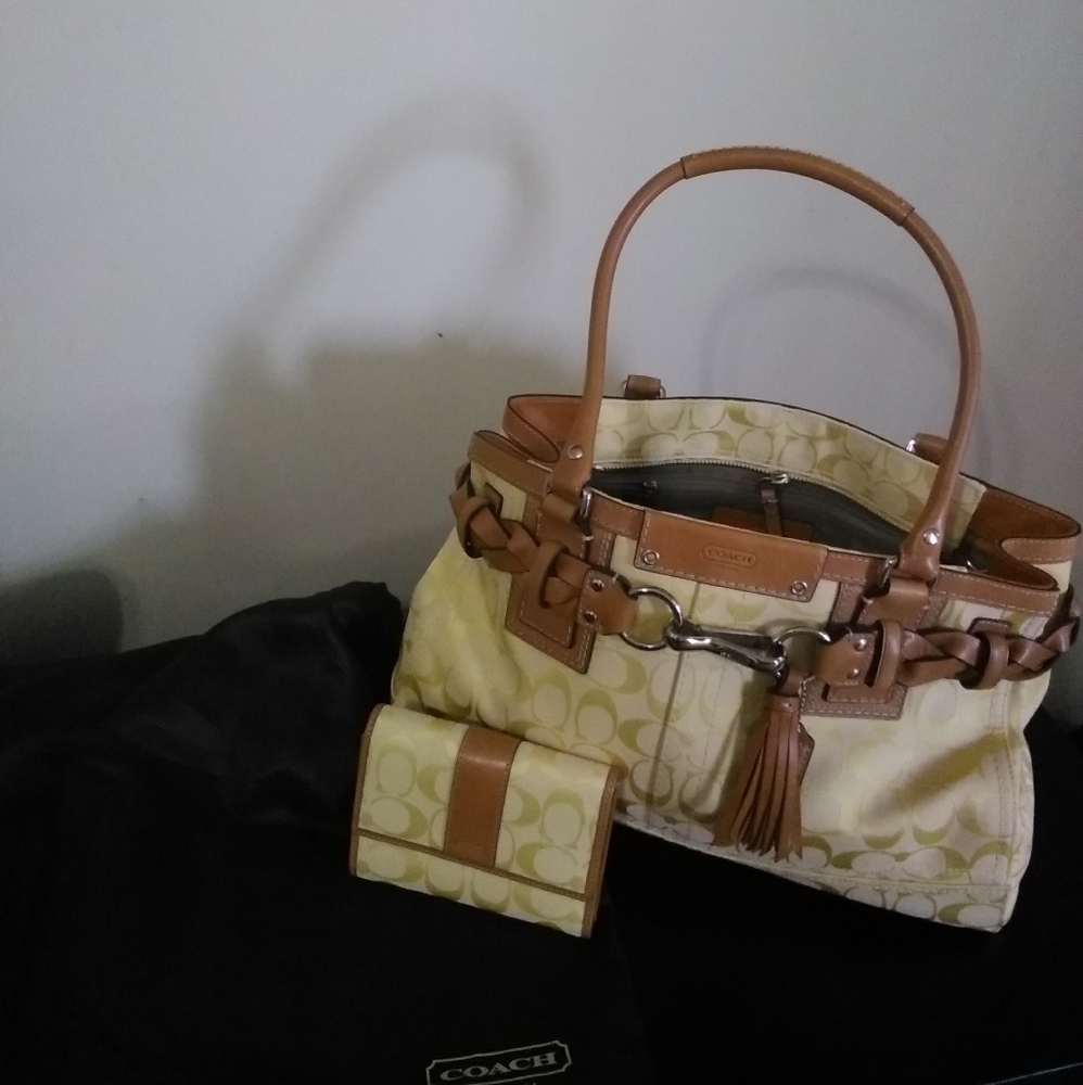 Gently used Coach handbag with wallet.